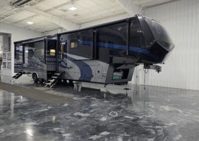 Luxe Toy Hauler 46FB luxury fifth wheel with full-body paint and slide-outs