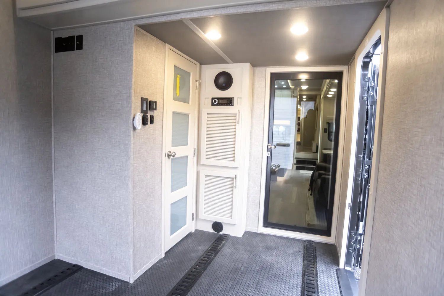 The entrance into the flex garage space on a Luxe 5th Wheel Toy Hauler.