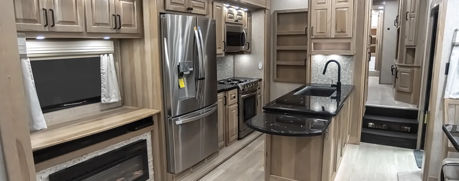 Hickory interior of Luxe luxury fifth wheel toy hauler, built by Luxe Fifth Wheel.