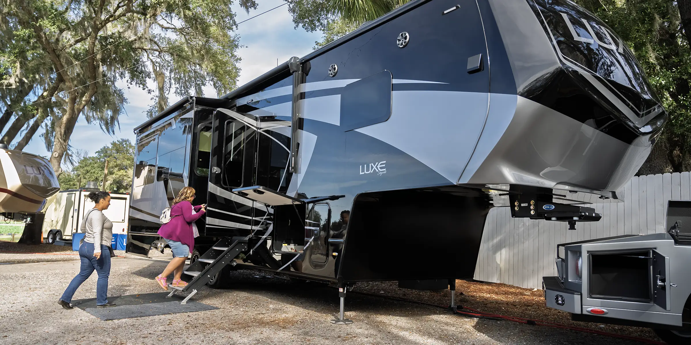 A luxury fifth wheel by Luxe Fifth Wheel at the Luxe 2024 Tampa Meet-N-Greet, held at the same time as the Florida RV SuperShow in Tampa Florida.