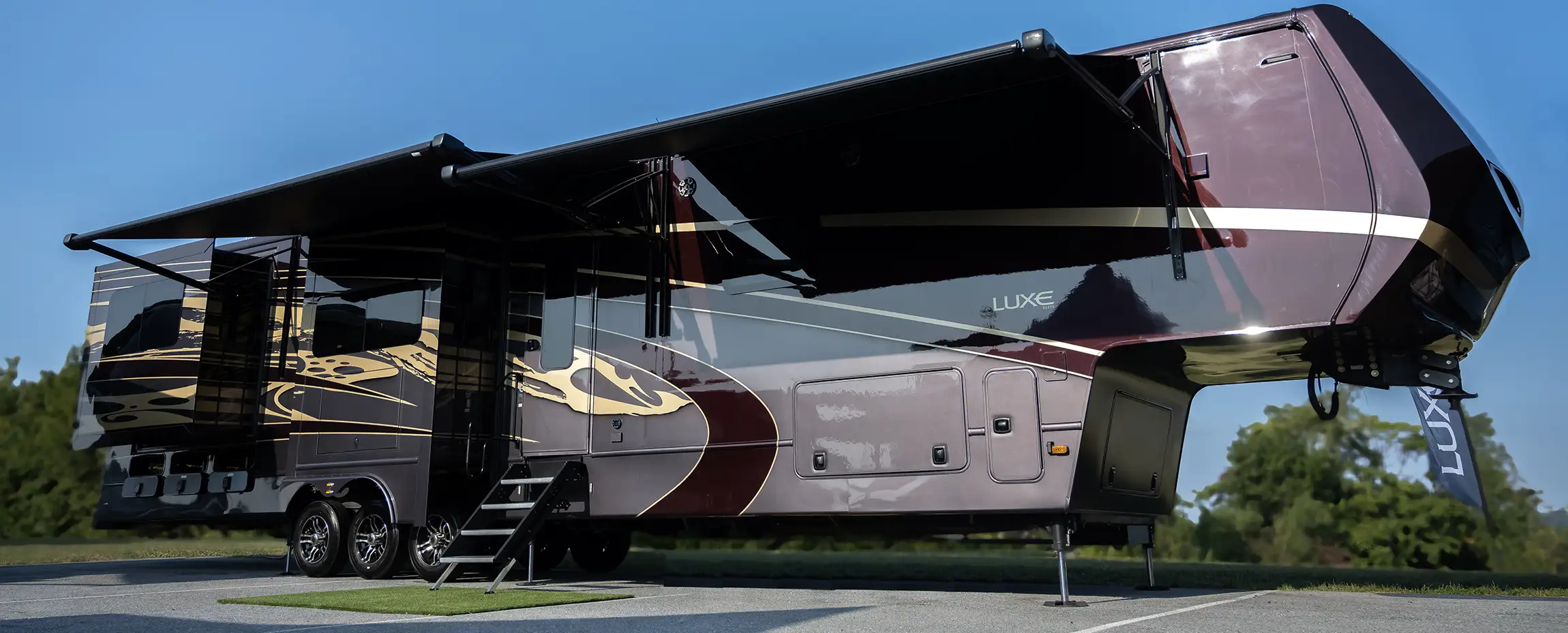 A luxury rear kitchen fifth wheel by Luxe Fifth Wheel.