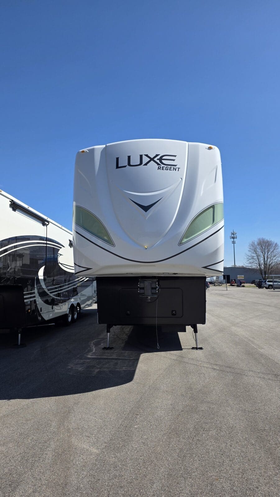 Luxe Regent 48FLB luxury fifth wheel RV front exterior with full-body paint and slide-outs