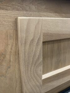 Woodgrain textures of hardwood cabinet in Luxe Toy Hauler 46FB.