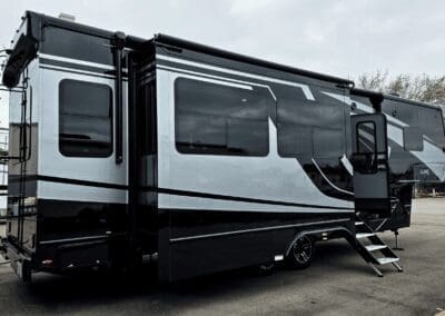 2024 pre-owned Luxe Elegante luxury fifth wheel RV with slide-outs, full-body paint, and residential